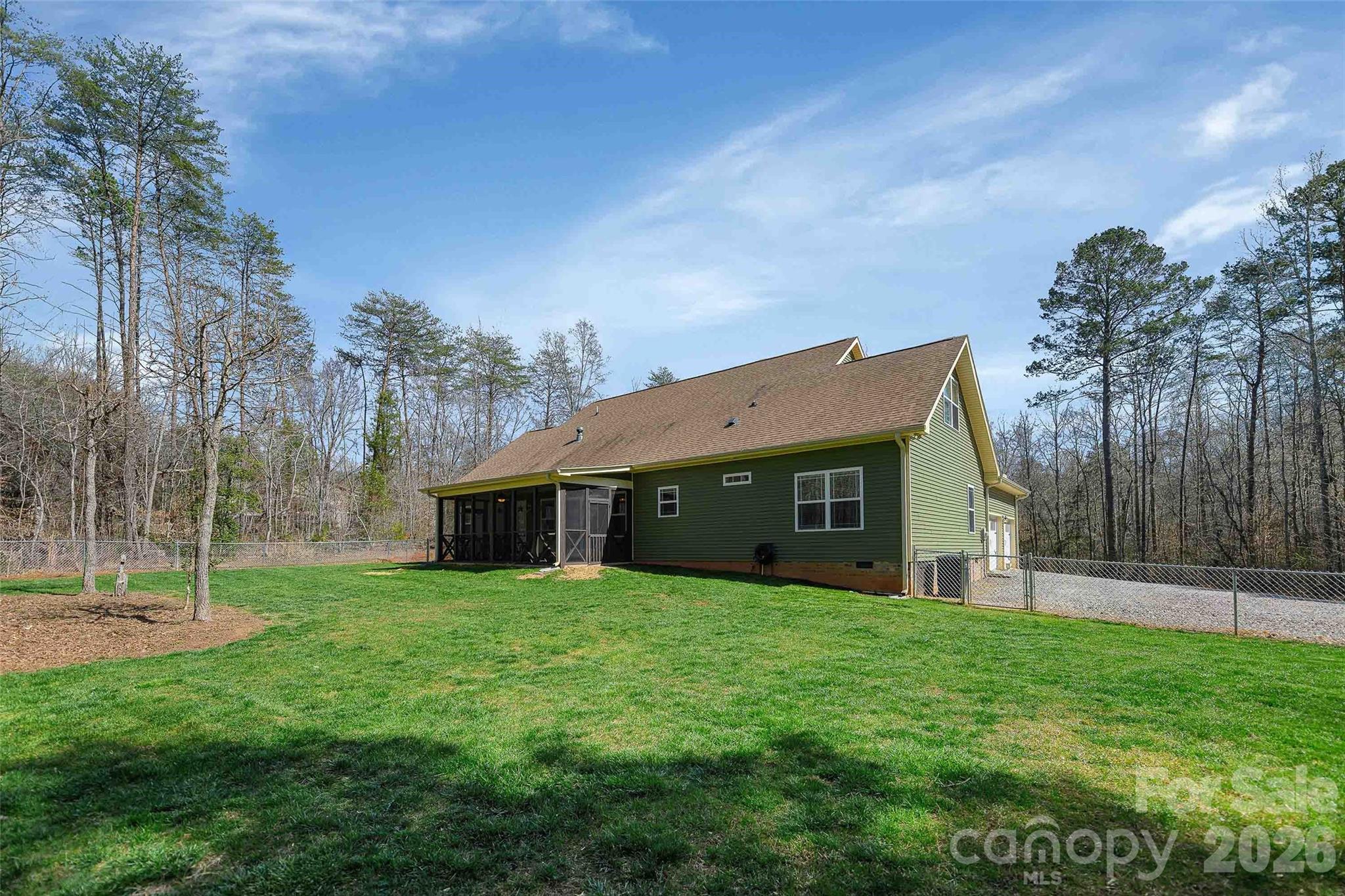 211 Holly Ridge Road Dallas, NC 28034 - Photo 39 of 46 a view of a house with a yard