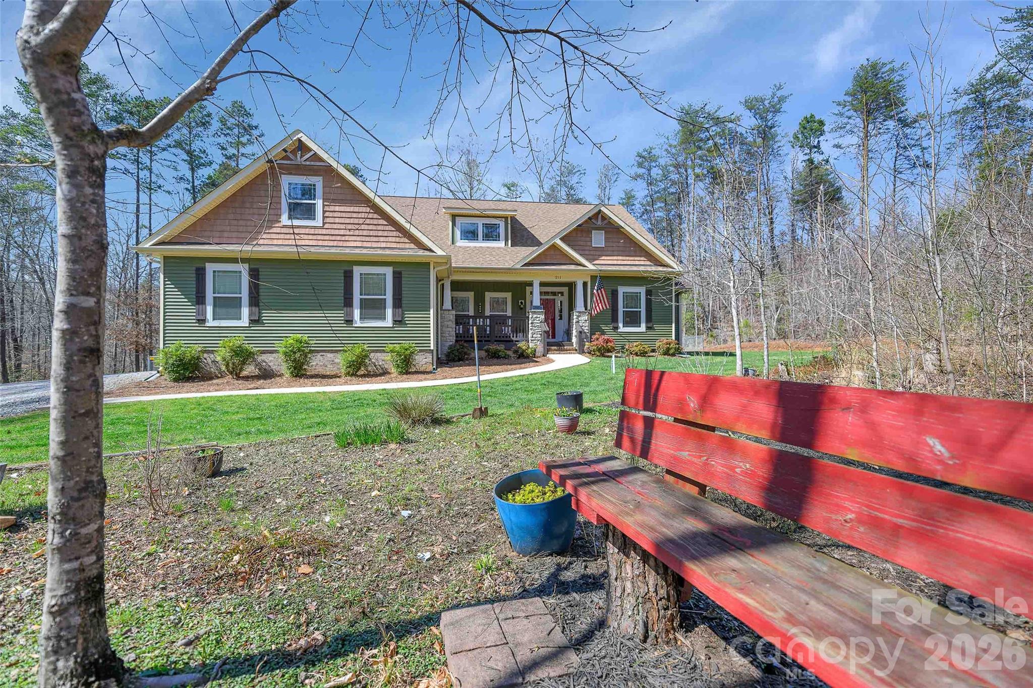 211 Holly Ridge Road Dallas, NC 28034 - Photo 44 of 46 a front view of a house with porch