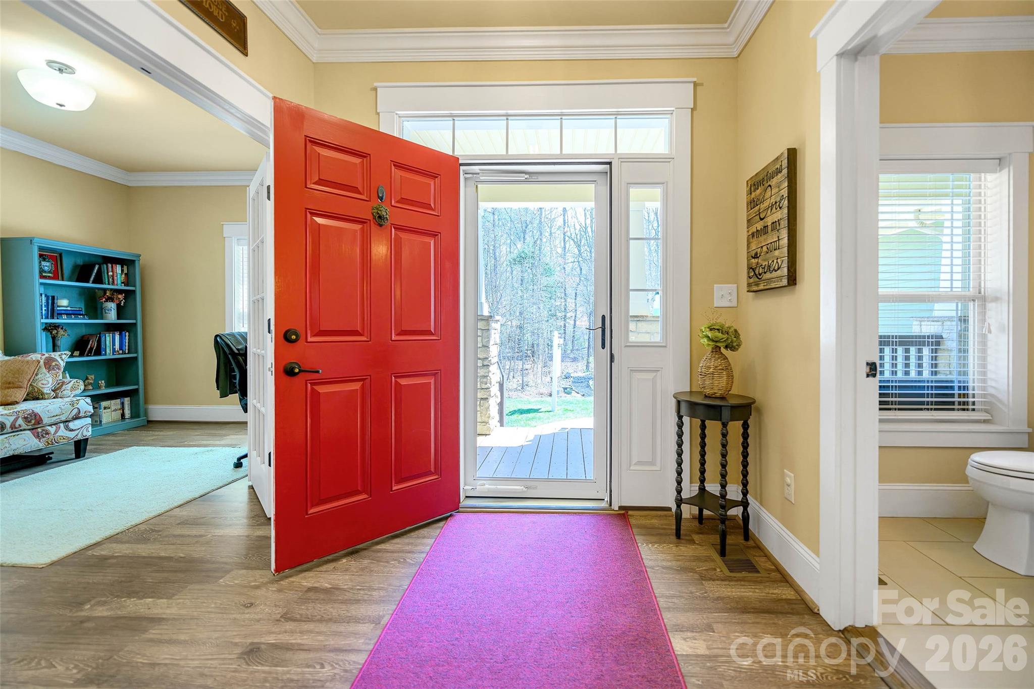 211 Holly Ridge Road Dallas, NC 28034 - Photo 8 of 46 a view of an empty room and a window