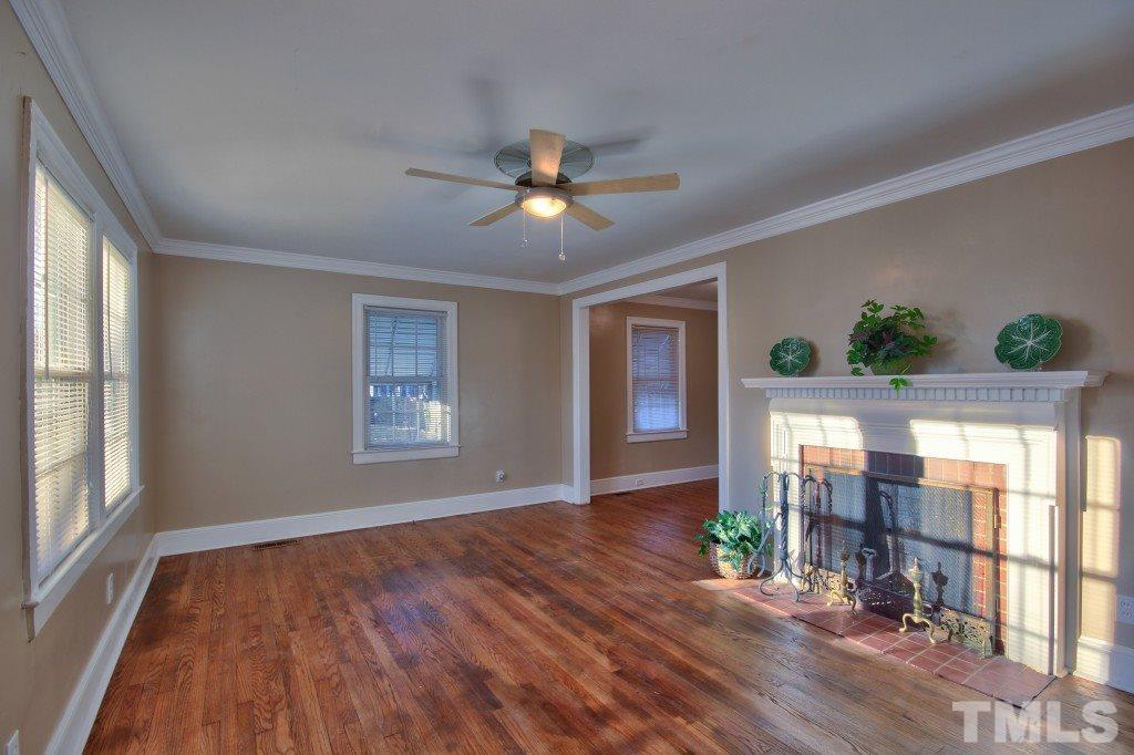 25 Bagwell Avenue Raleigh, NC 27607 - Photo 4 of 19 a view of livingroom with furniture wooden floor and a window