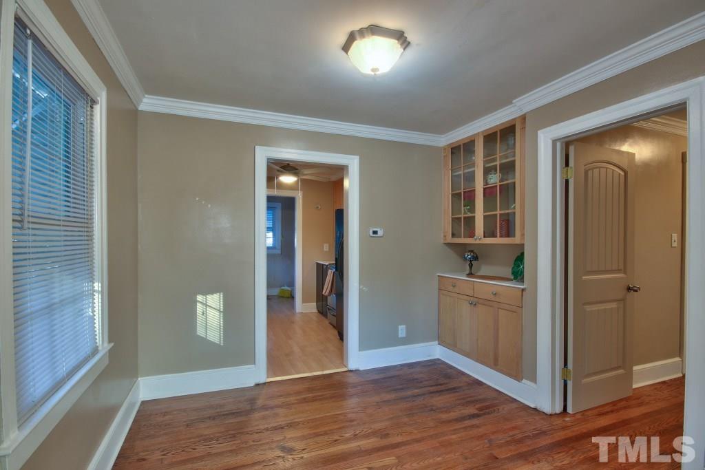 25 Bagwell Avenue Raleigh, NC 27607 - Photo 6 of 19 wooden floor in an empty room with a window