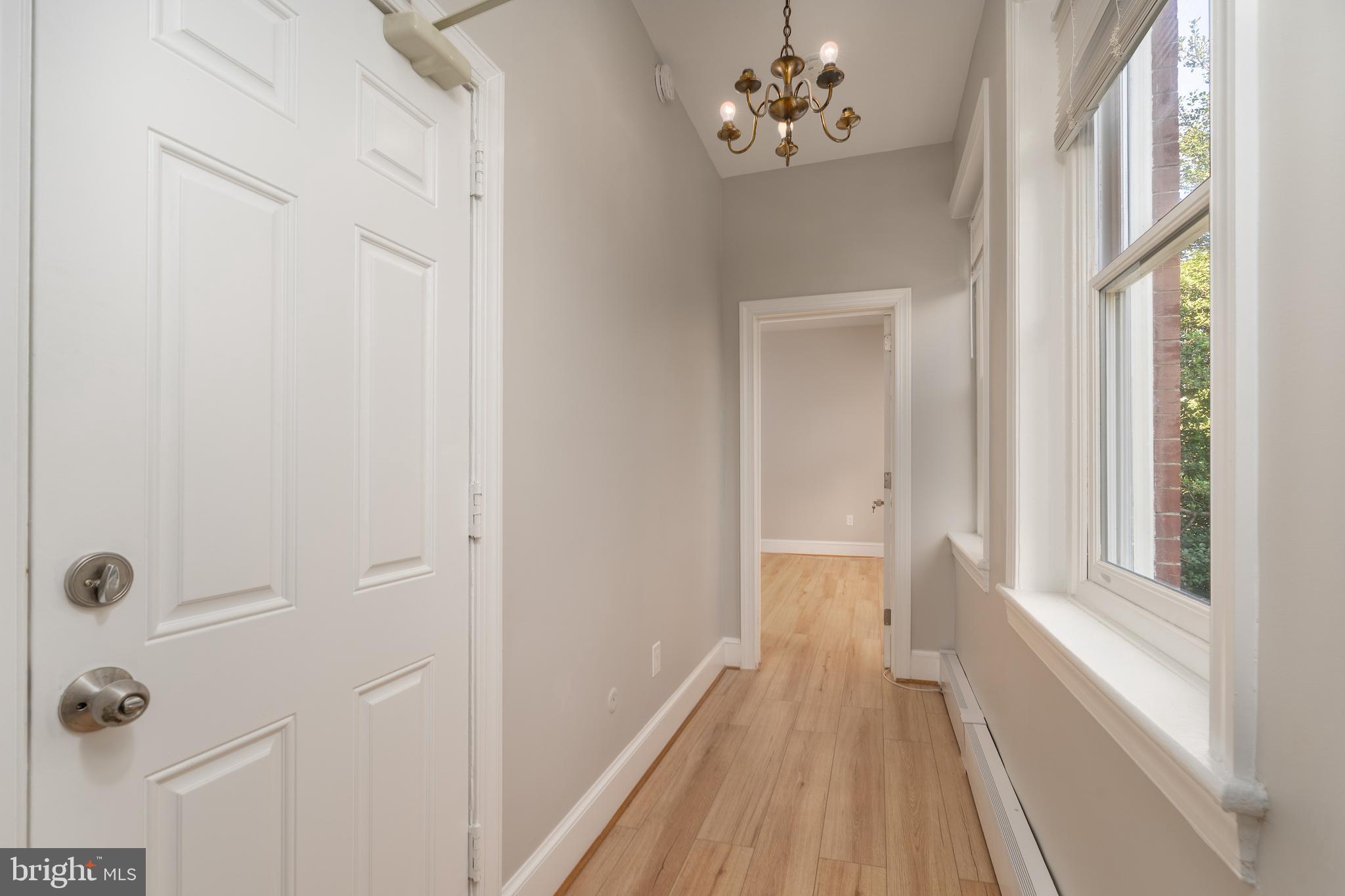 523 Constitution Avenue Northeast, Unit 3 Washington, DC 20002 - Photo 9 of 16 a view of a bathroom with a chandelier