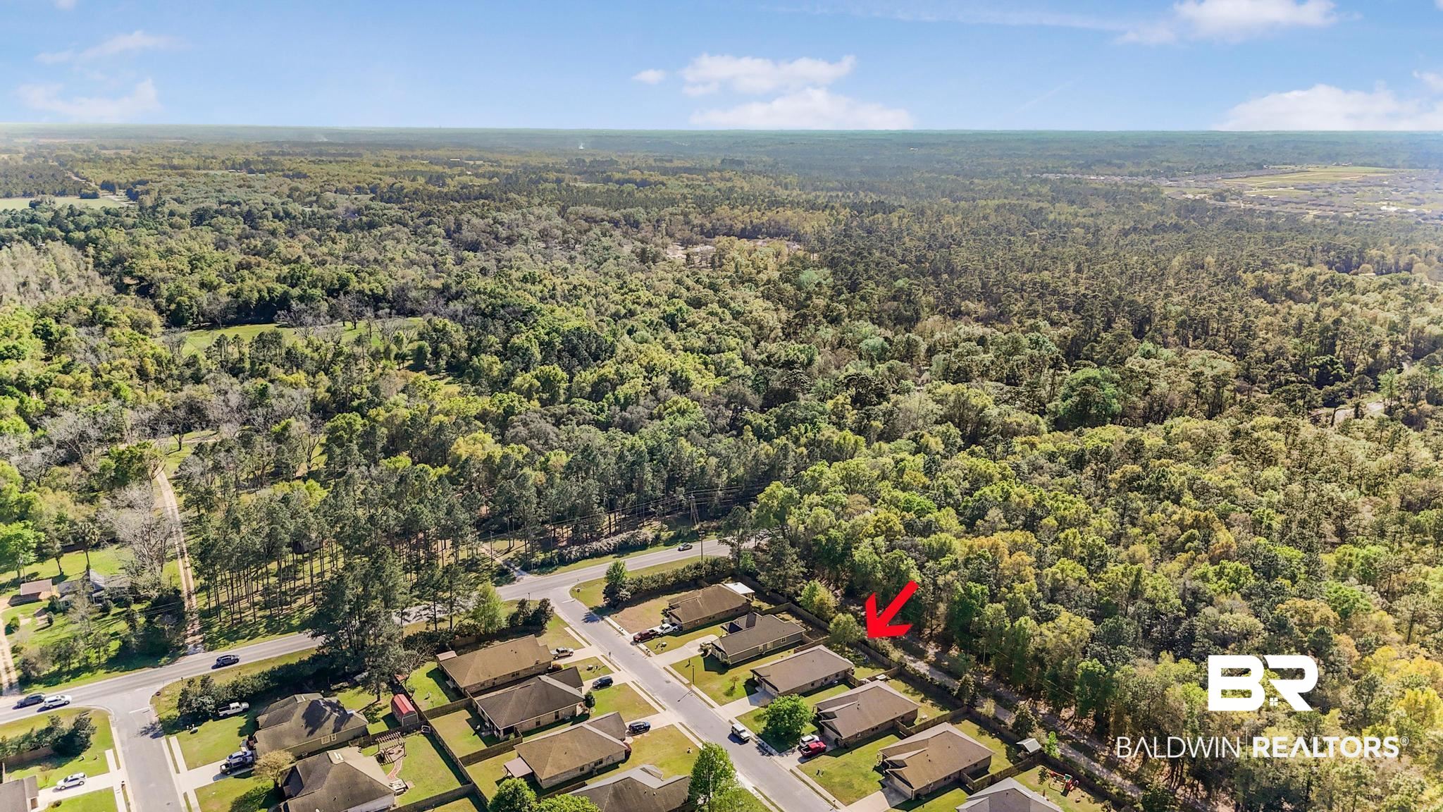22043 Garland Loop Silverhill, AL 36576 - Photo 38 of 41 Aerial perspective of suburban area featuring a heavily wooded area