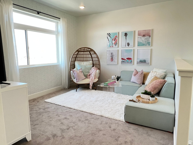 1951 2900 West Provo, UT 84601 - Photo 20 of 21 Carpeted room featuring a large window with white blinds, a patterned accent wall, recessed lighting, and a white baseboard