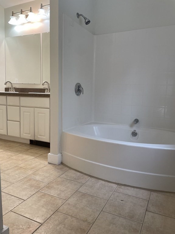 105 Sand Hill Road Shutesbury, MA 01072 - Photo 16 of 30 a bathroom with a bathtub and a sink