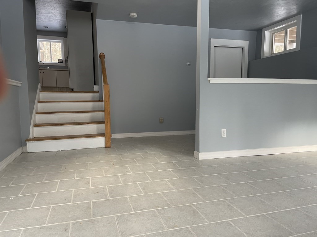 105 Sand Hill Road Shutesbury, MA 01072 - Photo 19 of 30 a view of an empty room with stairs