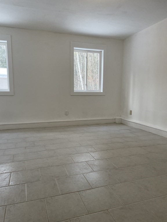 105 Sand Hill Road Shutesbury, MA 01072 - Photo 20 of 30 an empty room with a window