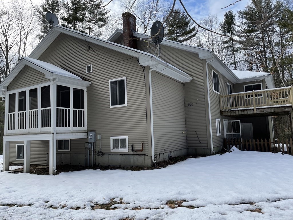 105 Sand Hill Road Shutesbury, MA 01072 - Photo 27 of 30 a view of a house with a yard