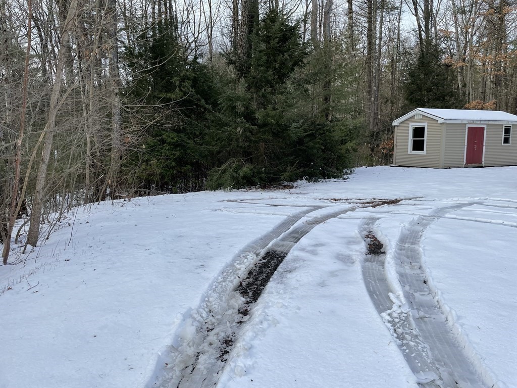 105 Sand Hill Road Shutesbury, MA 01072 - Photo 28 of 30 a view of white house with a yard