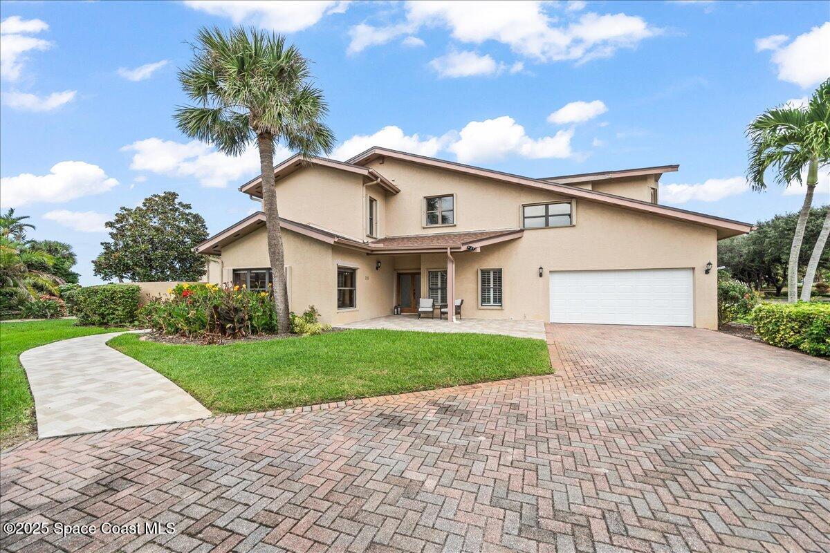 208 The Road, Unit C2 Melbourne Beach, FL 32951 - Photo 47 of 65 Paver driveway