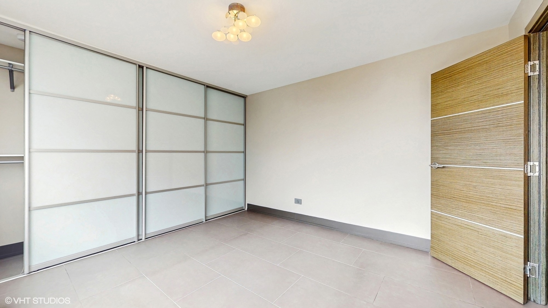 71 East Division Street, Unit 1801 Chicago, IL 60611 - Photo 19 of 31 a view of a room with rack on the wall