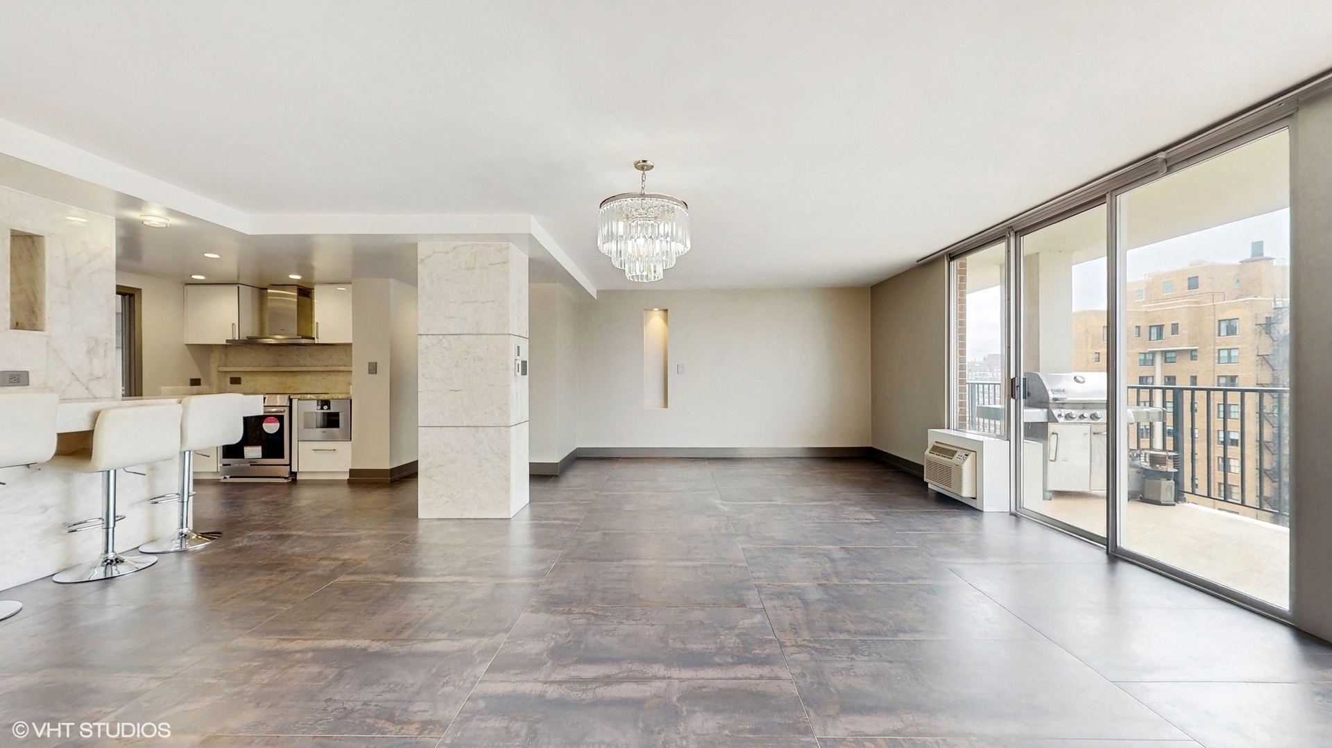 71 East Division Street, Unit 1801 Chicago, IL 60611 - Photo 4 of 31 a view of an empty room with a window