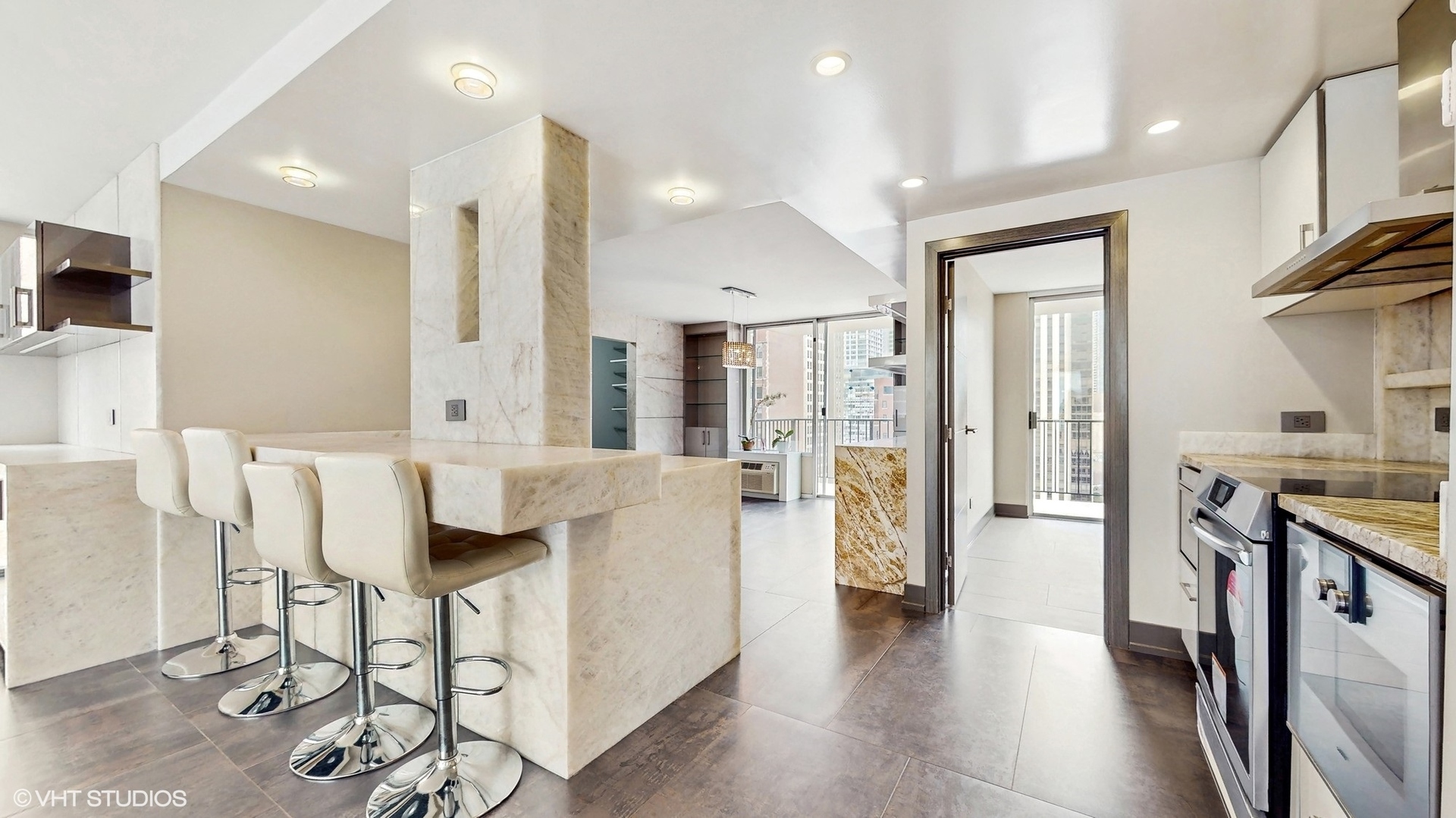 71 East Division Street, Unit 1801 Chicago, IL 60611 - Photo 5 of 31 a living room with furniture and a wooden floor
