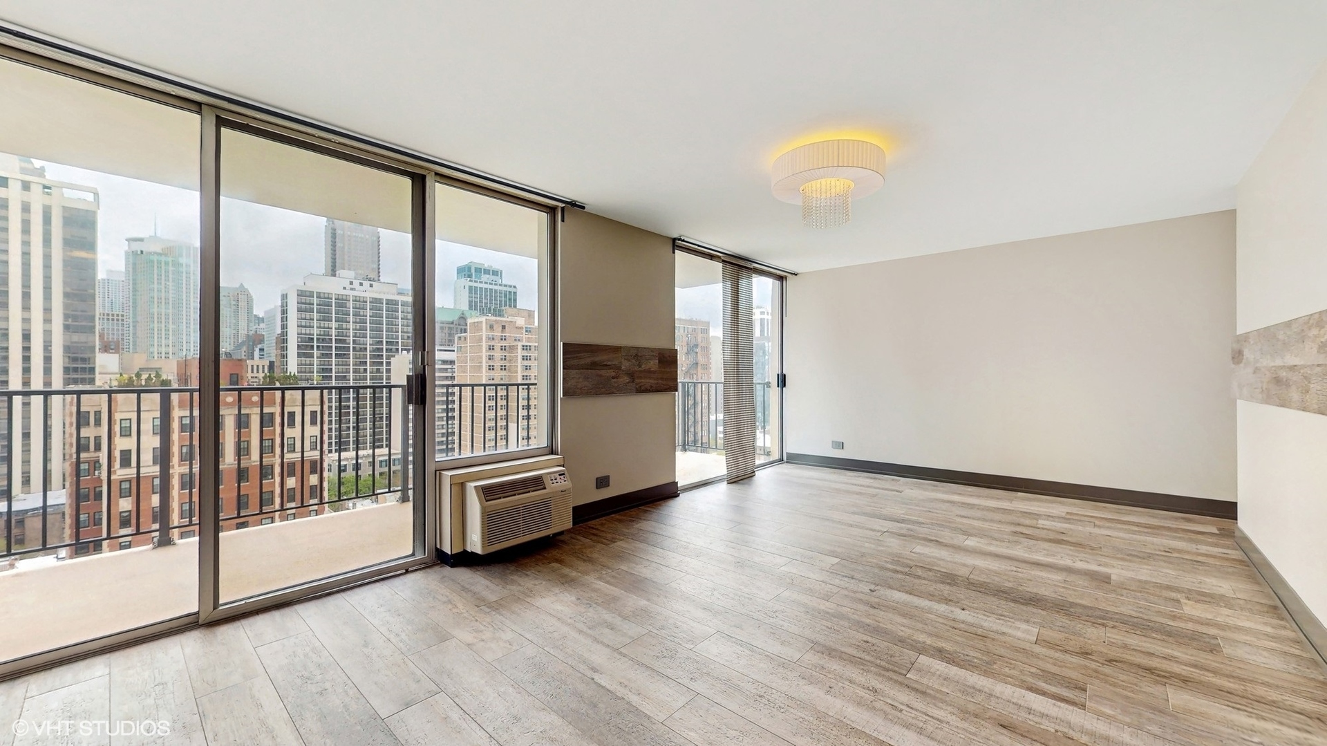 71 East Division Street, Unit 1801 Chicago, IL 60611 - Photo 8 of 31 a view of an entryway with wooden floor