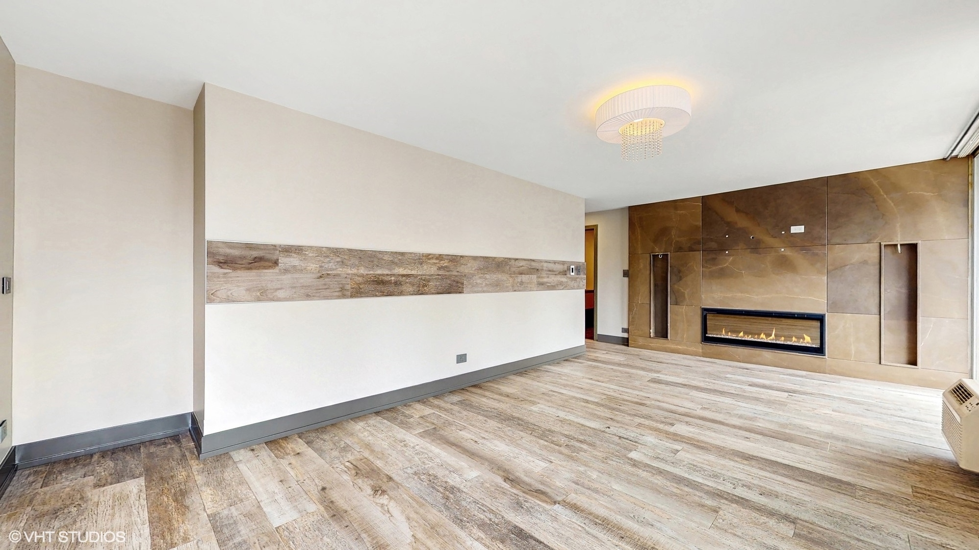 71 East Division Street, Unit 1801 Chicago, IL 60611 - Photo 9 of 31 a view of an empty room with a window