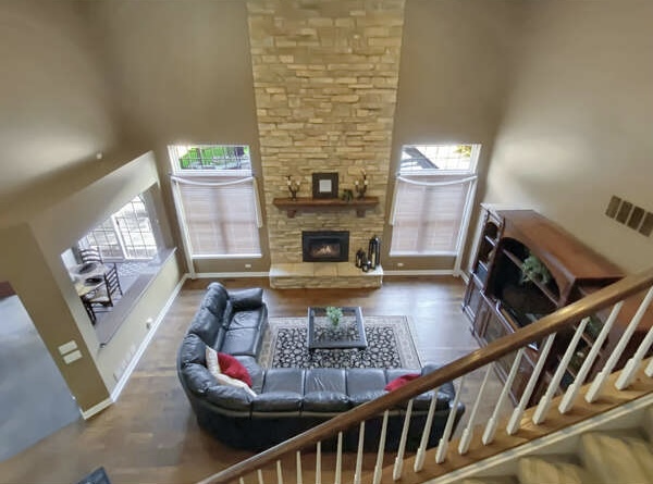 1408 Mink Trail Cary, IL 60013 - Photo 16 of 34 a living room with furniture and a fireplace