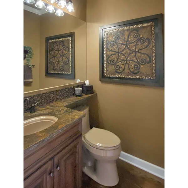 1408 Mink Trail Cary, IL 60013 - Photo 19 of 34 a bathroom with a toilet sink and mirror