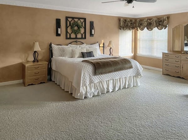 1408 Mink Trail Cary, IL 60013 - Photo 26 of 34 a spacious bedroom with a bed and a window