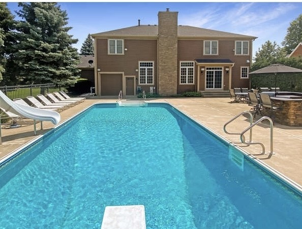 1408 Mink Trail Cary, IL 60013 - Photo 3 of 34 a view of a house with backyard and swimming pool