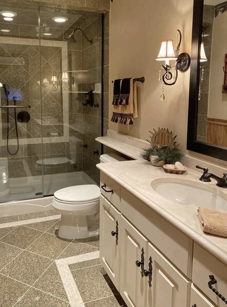 1408 Mink Trail Cary, IL 60013 - Photo 33 of 34 a bathroom with a sink a toilet and shower