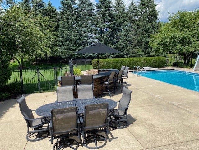 1408 Mink Trail Cary, IL 60013 - Photo 6 of 34 a view of backyard with outdoor seating a patio and plants