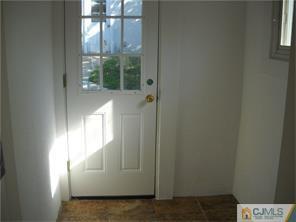 227 Washington Road Sayreville, NJ 08872 - Photo 4 of 16 a view of an empty room and window