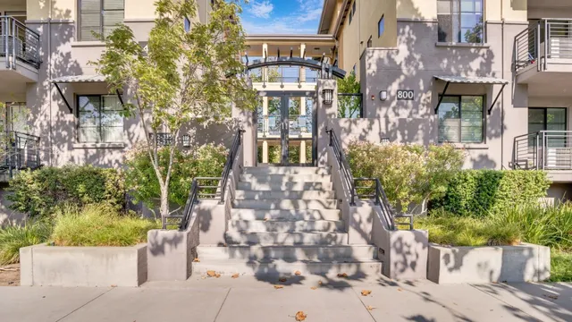 a front view of a multi story residential apartment building