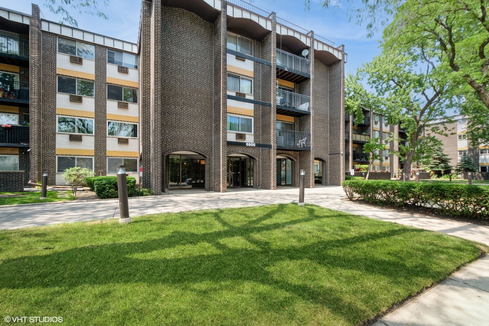 a view of an apartment with a garden and plants