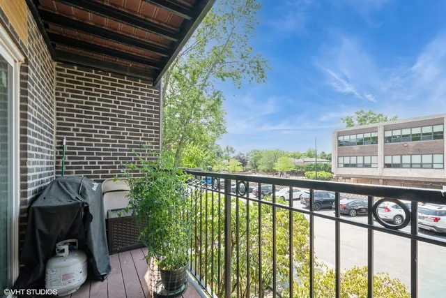 a view of a balcony with an outdoor space