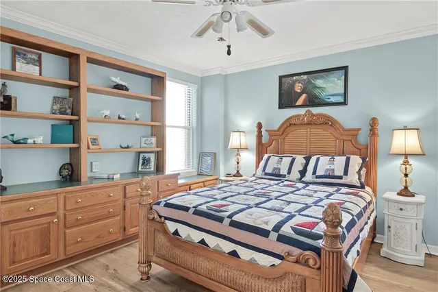 a bedroom with a bed and a cabinets