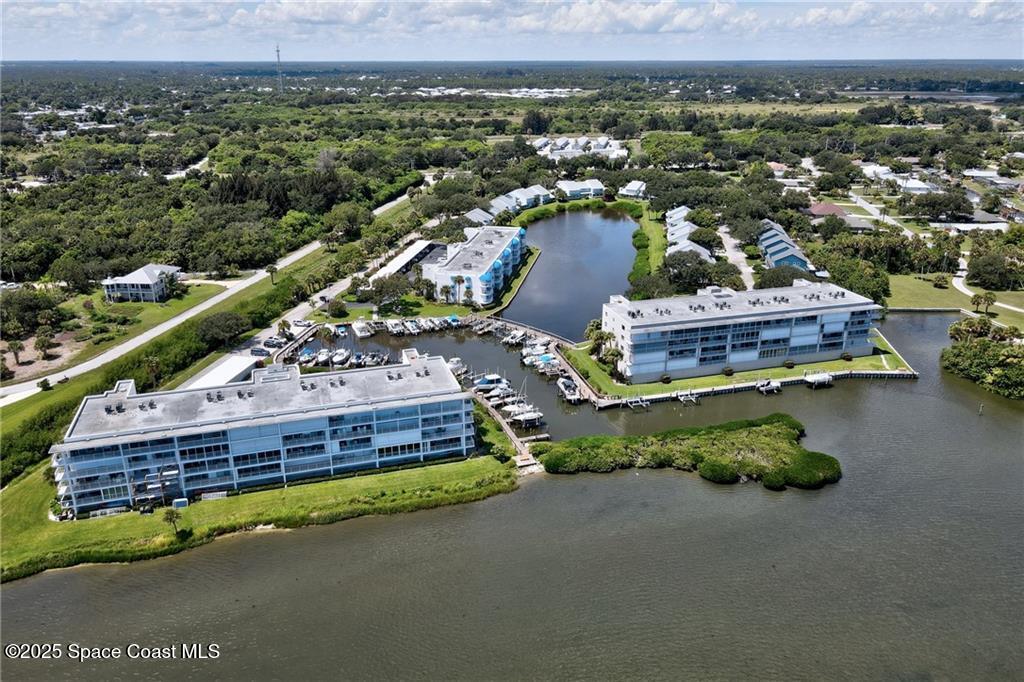 6061 North River Run Drive, Unit 6061 Sebastian, FL 32958 - Photo 32 of 36 a view of a house with a yard and a mountain view