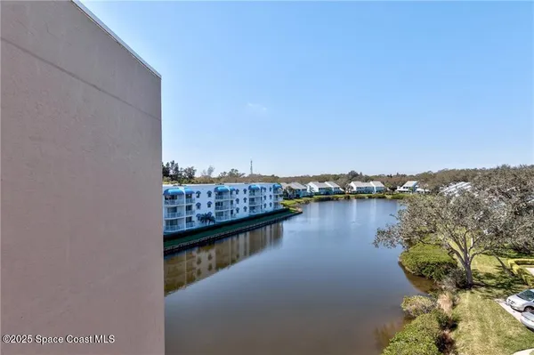 a view of a lake from a balcony