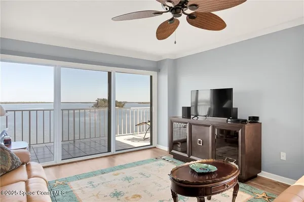 a room with furniture and a flat screen tv