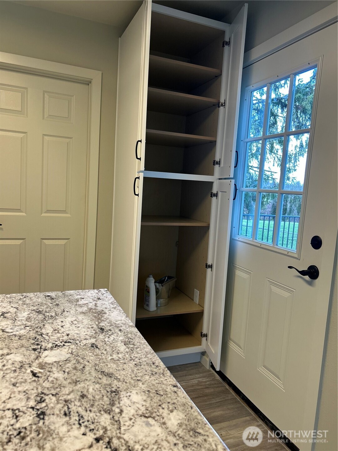 1365 Dolan Street Raymond, WA 98577 - Photo 11 of 24 a bedroom with a bed and a window