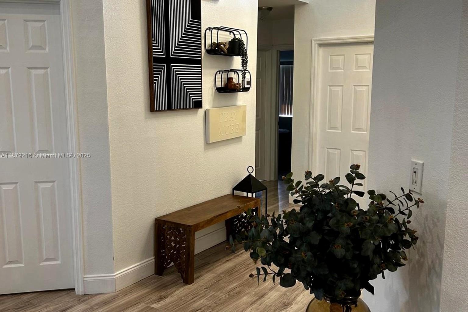 13221 Southwest 53rd Street Miramar, FL 33027 - Photo 22 of 24 a room that has a bed and a dresser