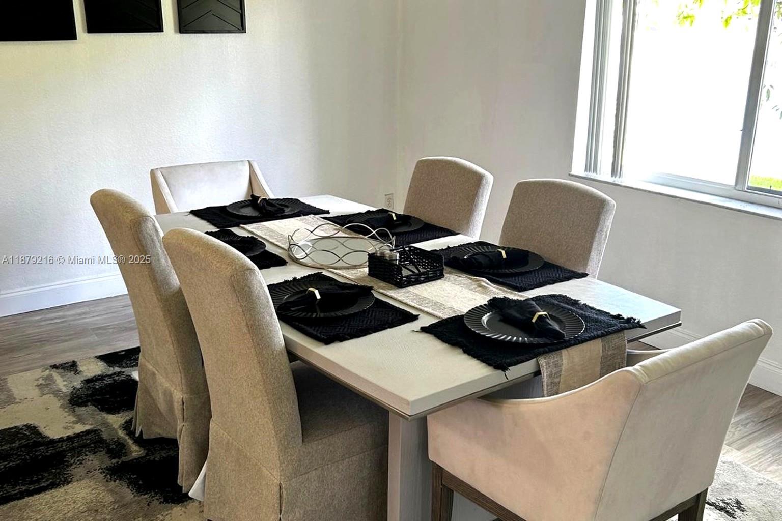 13221 Southwest 53rd Street Miramar, FL 33027 - Photo 9 of 24 a living room with furniture and a window