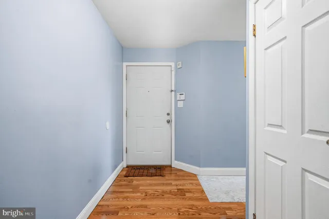 wooden floor with an empty room and workspace