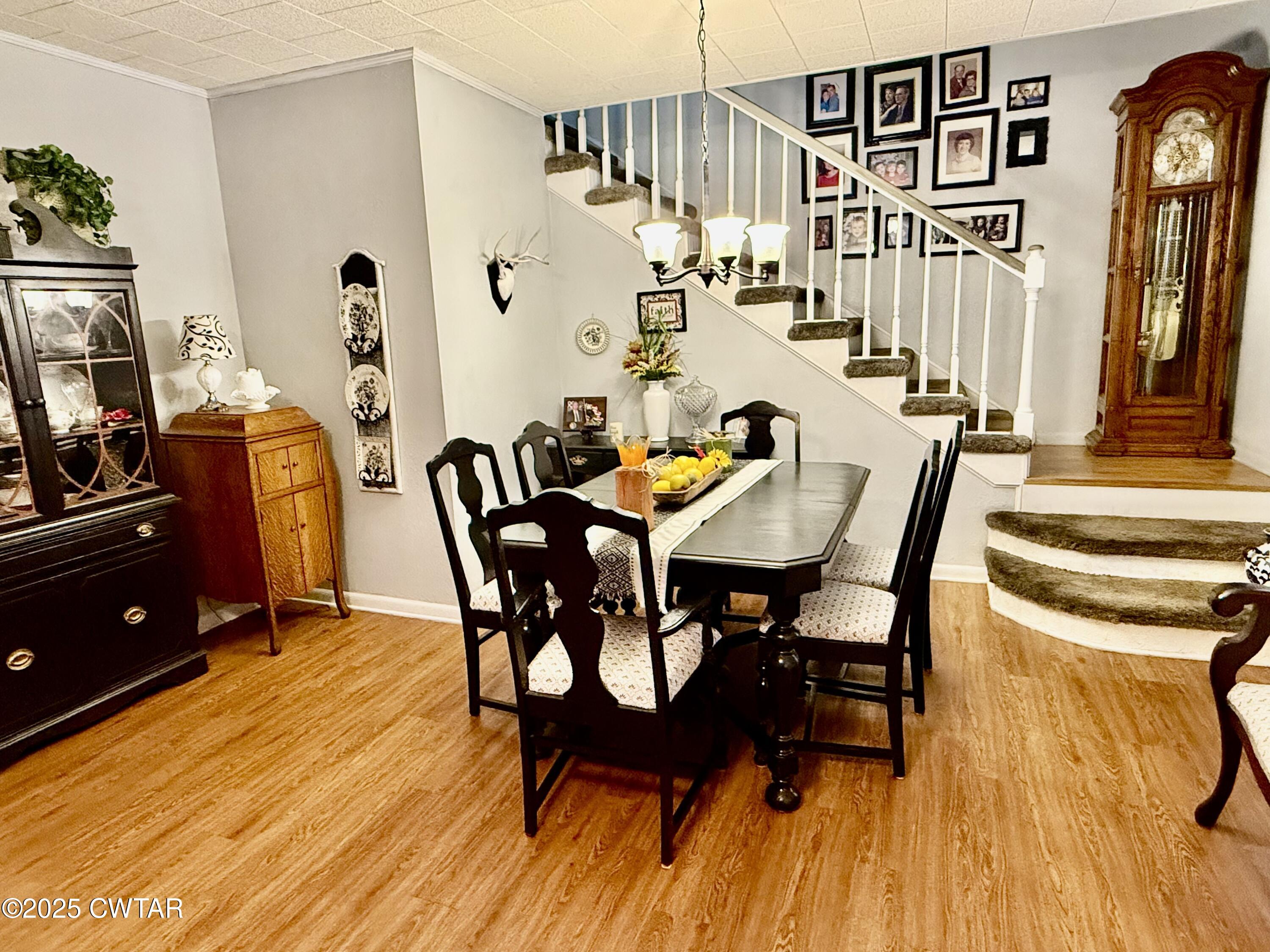 3121 Lantern Lane Union City, TN 38261 - Photo 11 of 19 a view of a dining room with furniture and wooden floor