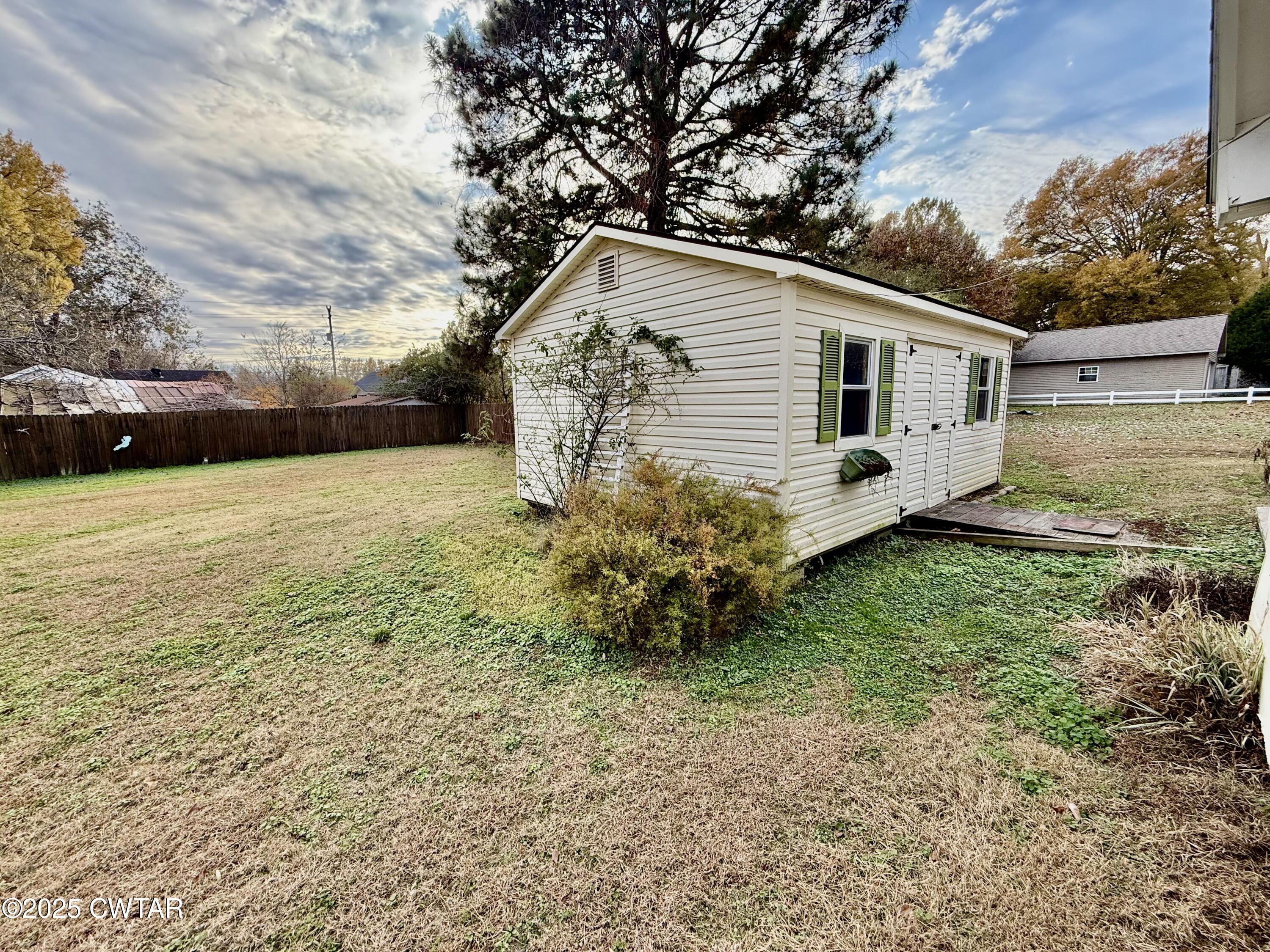3121 Lantern Lane Union City, TN 38261 - Photo 18 of 19 a view of a backyard of the house