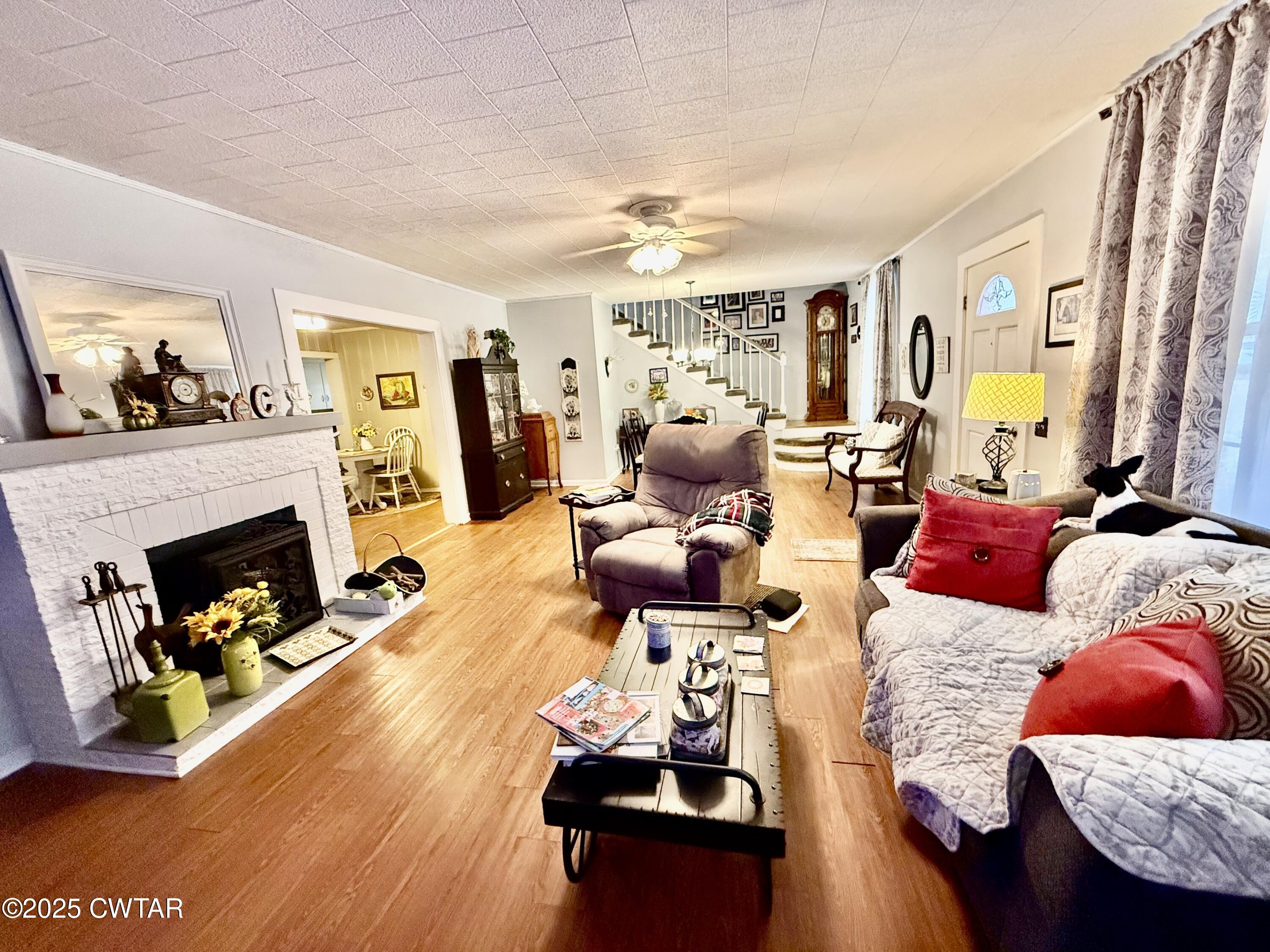 3121 Lantern Lane Union City, TN 38261 - Photo 2 of 19 a living room with furniture and a fireplace