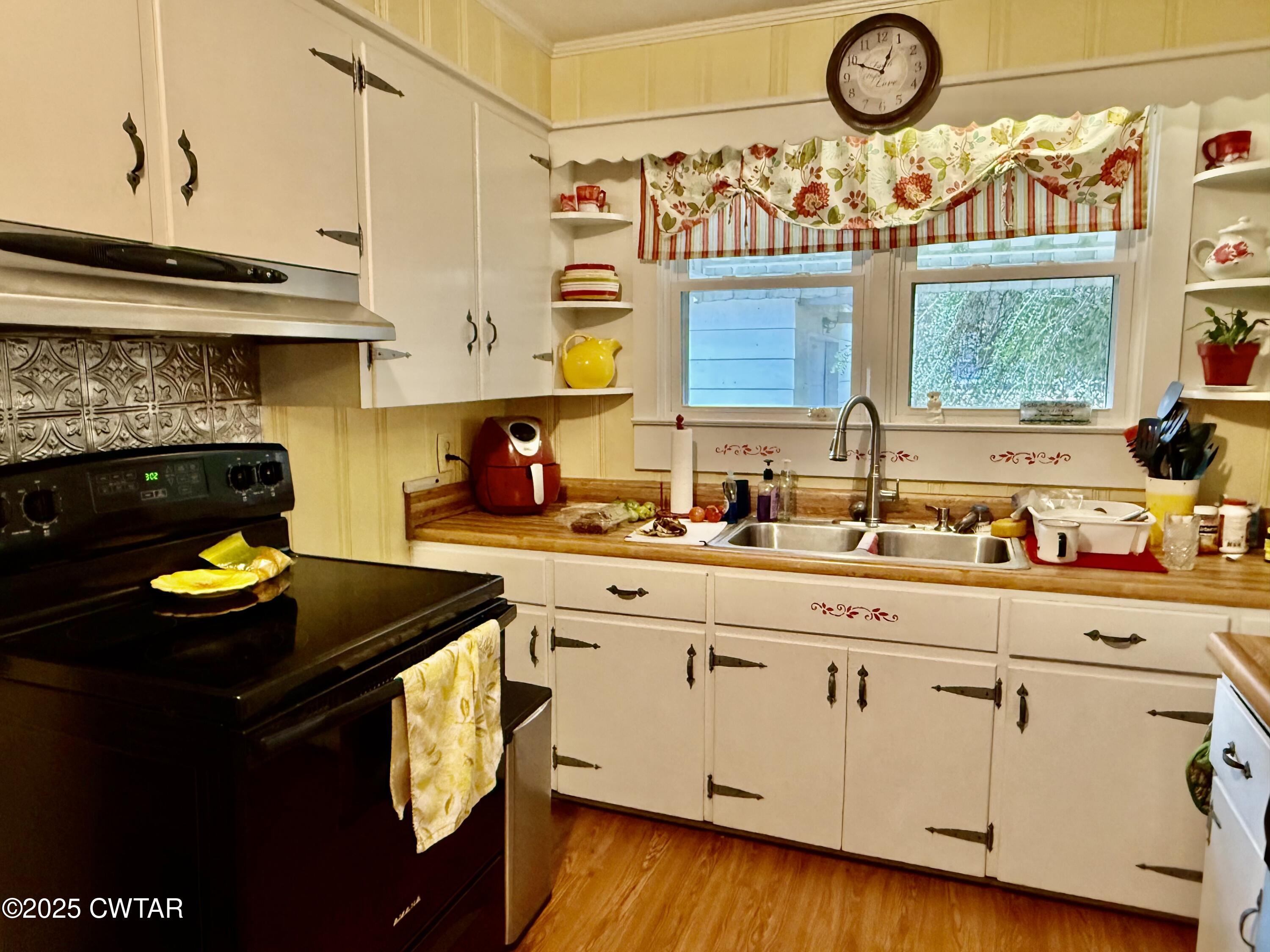 3121 Lantern Lane Union City, TN 38261 - Photo 5 of 19 a kitchen with a sink cabinets and window