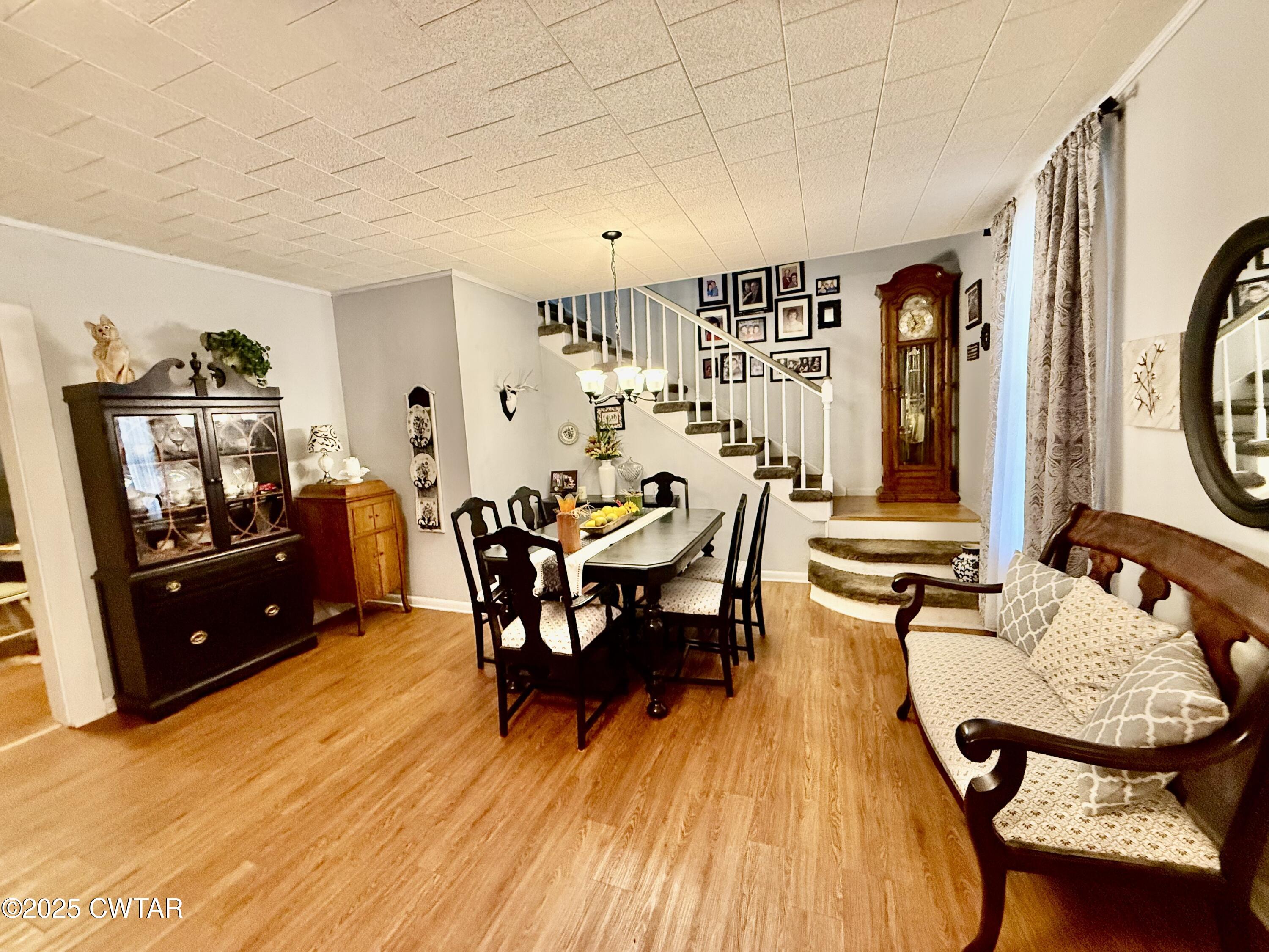 3121 Lantern Lane Union City, TN 38261 - Photo 9 of 19 a dining room with furniture and wooden floor