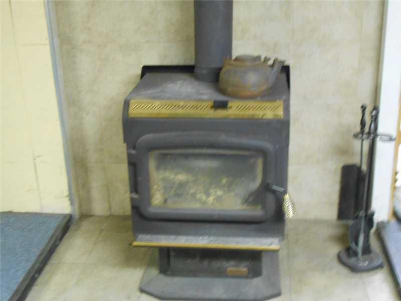 265 South Main Street Machias, ME 04654 - Photo 35 of 35 Den/Family/Great Room. Woodstove in...