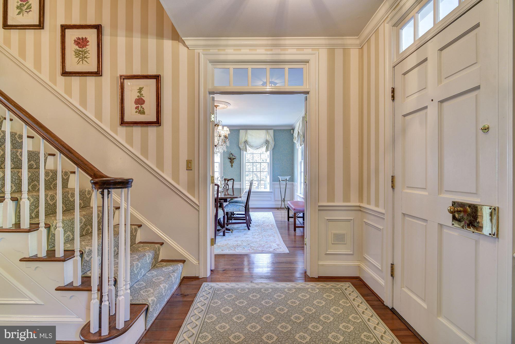 10908 Cripplegate Road Potomac, MD 20854 - Photo 3 of 29 a view of entryway and hall with wooden floor