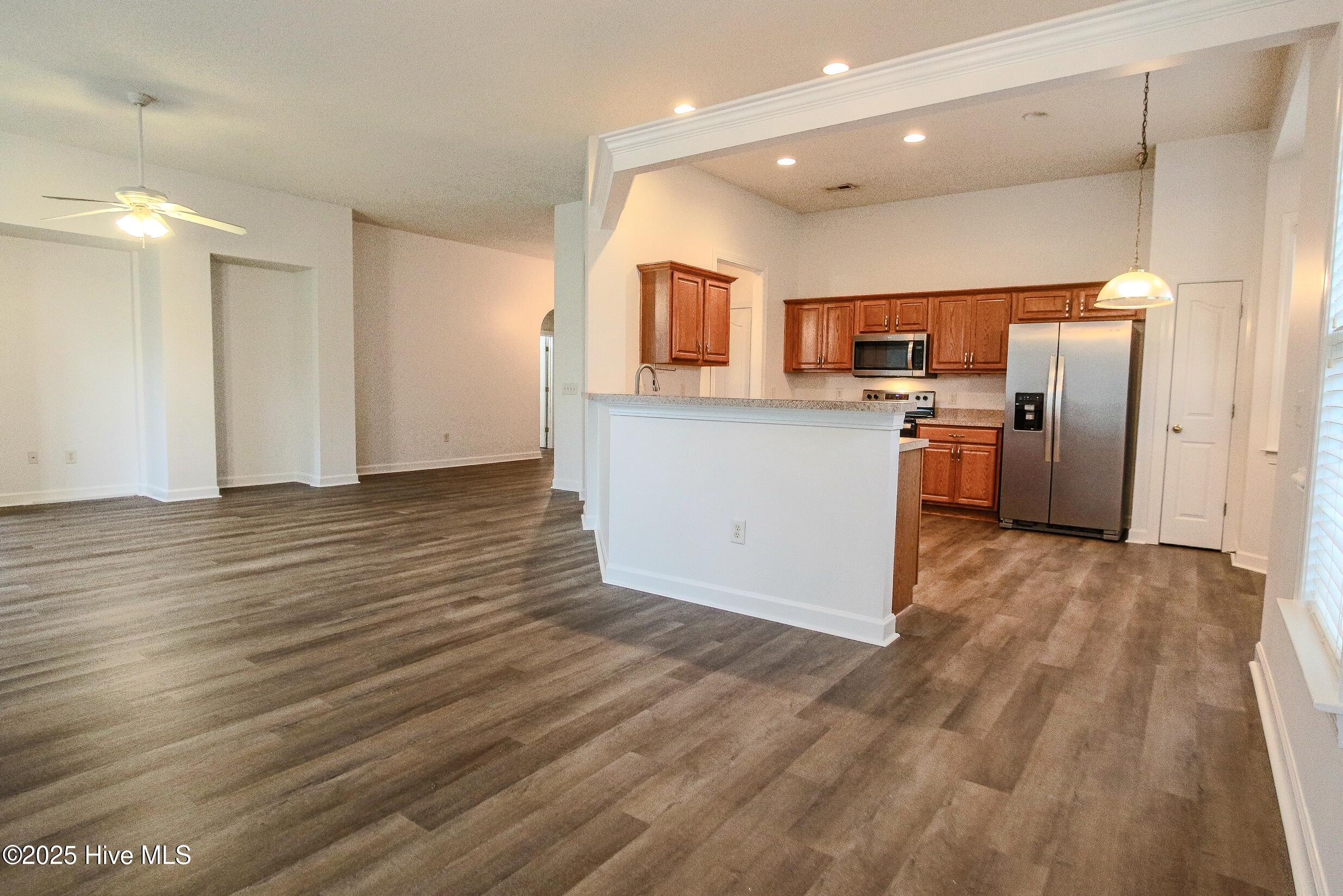 1005 Meadowlands Trail Calabash, NC 28467 - Photo 7 of 17 Kitchen & Living