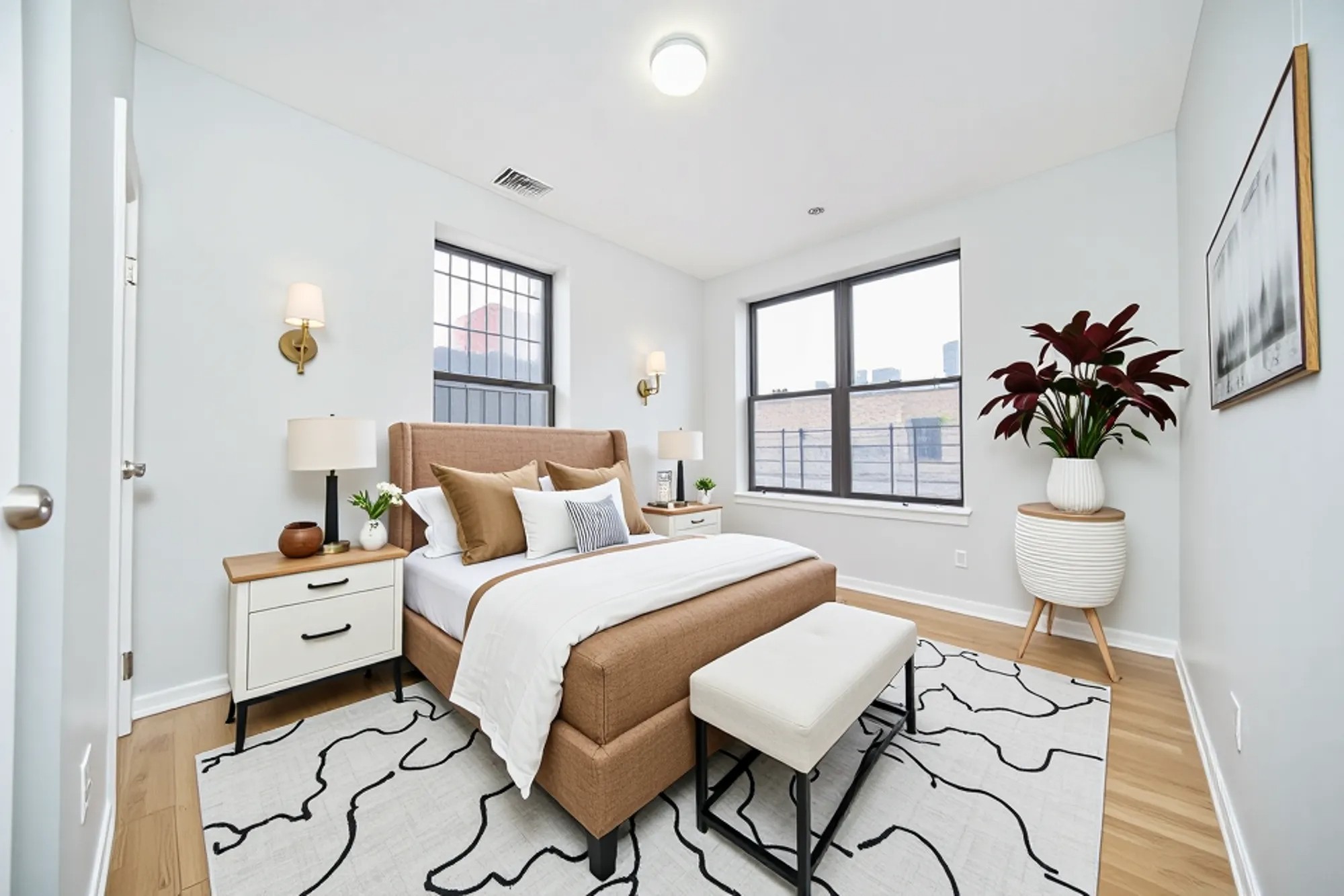 459 Sterling Place, Unit 3 Brooklyn, NY 11238 - Photo 4 of 7 a bedroom with a bed and wooden floor