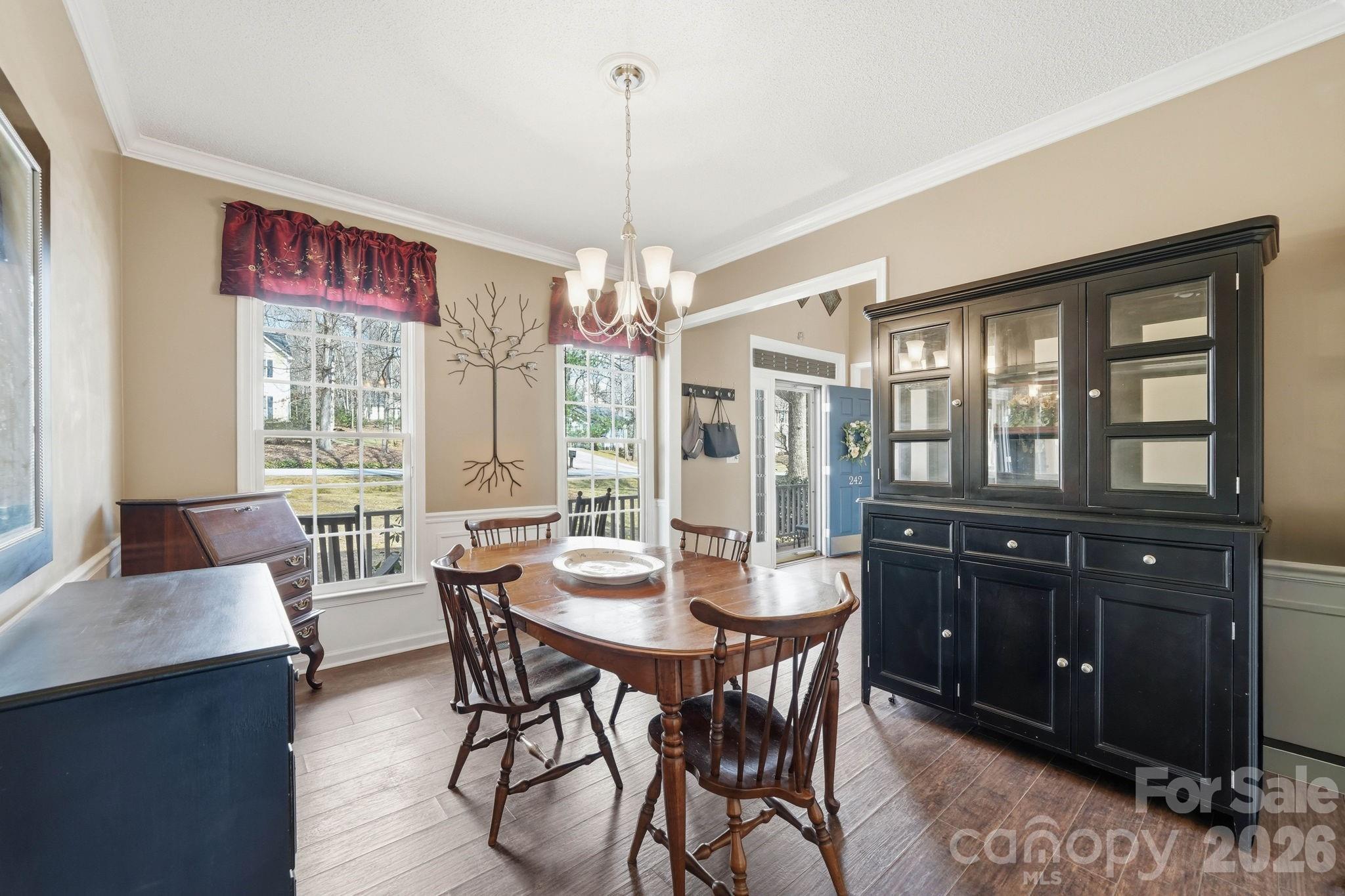 242 Windsor Forest Circle Fletcher, NC 28732 - Photo 18 of 43 a view of a dining room with furniture window and outside view