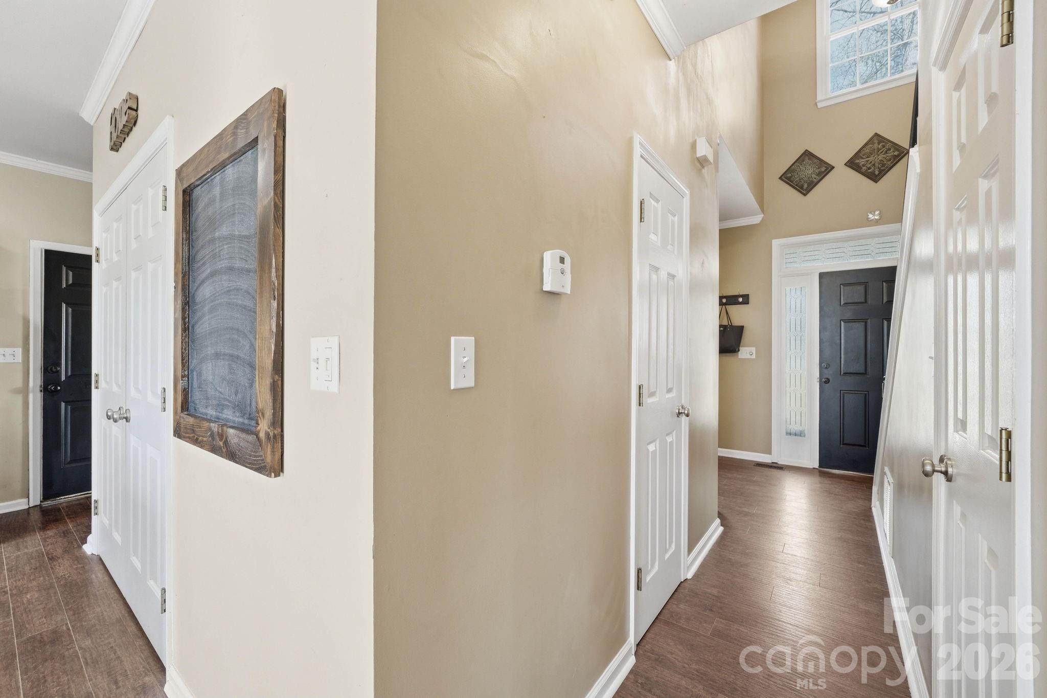242 Windsor Forest Circle Fletcher, NC 28732 - Photo 19 of 43 a view of a hallway with a white walls