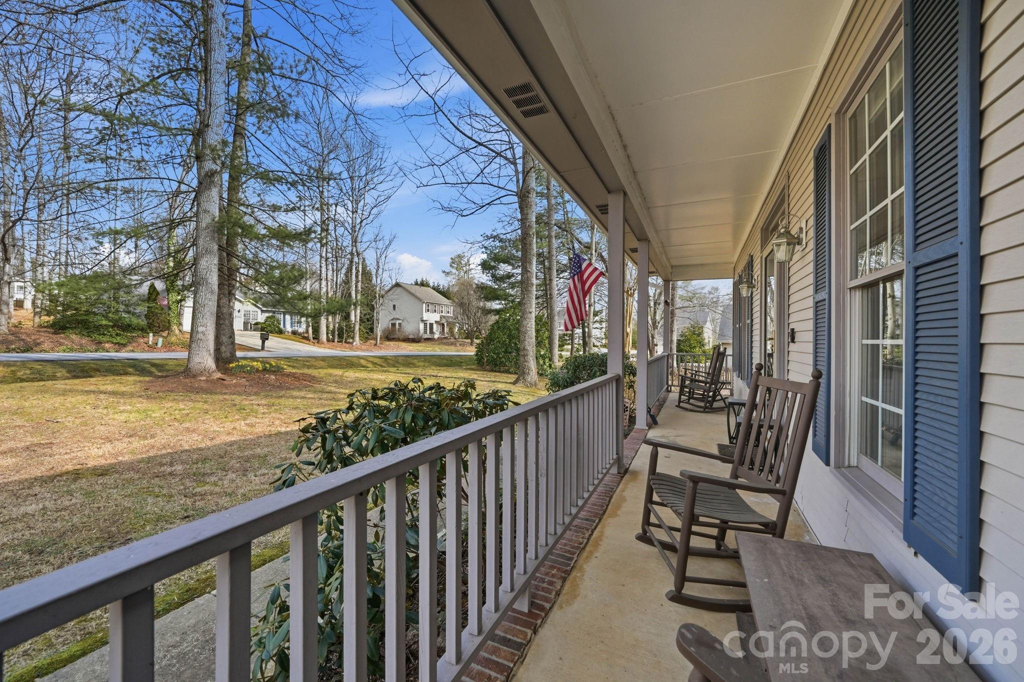 242 Windsor Forest Circle Fletcher, NC 28732 - Photo 3 of 43 a view of a porch with furniture and garden