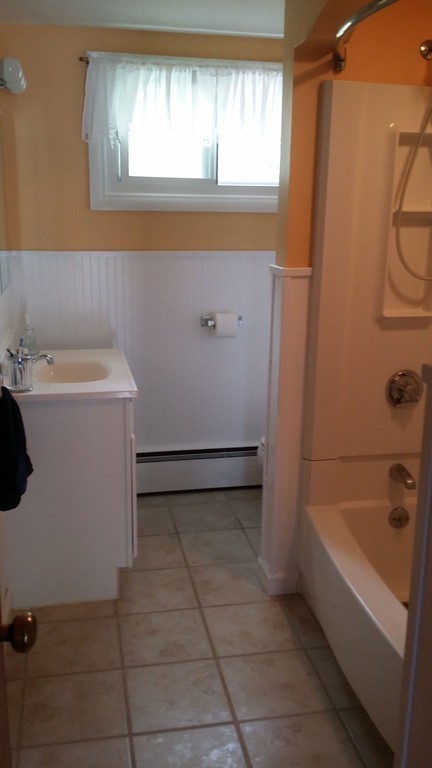 2 Boivin Avenue Ware, MA 01082 - Photo 15 of 21 a bathroom with a bathtub sink and window